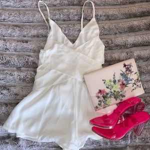 Super sexy, white romper.